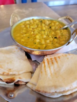 The best spiced chai and chana masala. at Remedy Cafe - South Side in Edmonton