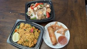 Cream cheese wontons, crispy spring roll, pineapple and tofu fried rice, glass noodle with tofu at Mana Thai Comfort Food in Longmont