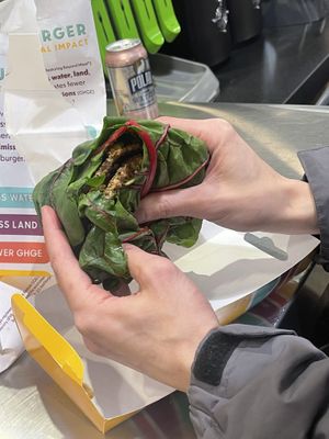 Double chz burger w added mushroom bac’n  roasted jalapeño and sub Swiss chard wrap  at PLNT Burger in Boston