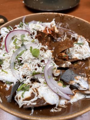 A nacho, mole, dish   at Pali Pali Alameda in Mexico City