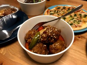 Take-out "Yurinchi" and pizza at T's Restaurant in Tokyo