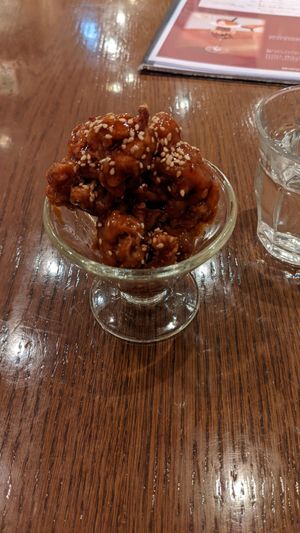 Not a dessert! It's the yurinchi (油淋鶏) soy meat option. at T's Restaurant in Tokyo