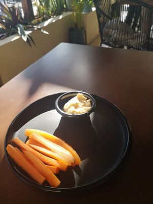 Carrots with hummus at Coral Vegan Pizza in Playa Del Carmen