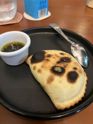 Spinach Empanada was amazing!   at Coral Vegan Pizza in Playa Del Carmen