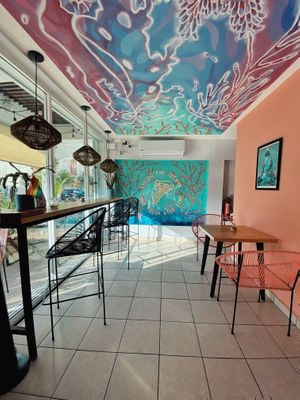 The design of the place🖤  at Coral Vegan Pizza in Playa Del Carmen