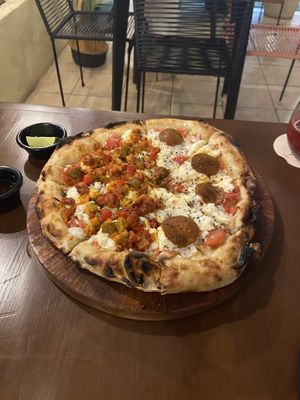 Half bolognesa lime, half pepperoni de mar   at Coral Vegan Pizza in Playa Del Carmen