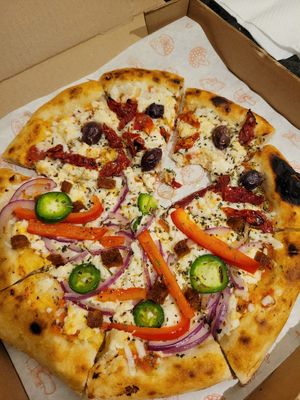 Pizza 1/2 Mexa & 1/2 Cozumel at Coral Vegan Pizza in Playa Del Carmen