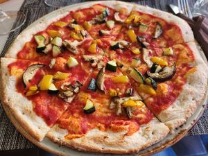 Vegetarian pizza veganized by removing cheese at Snack Bar Castello in Venice