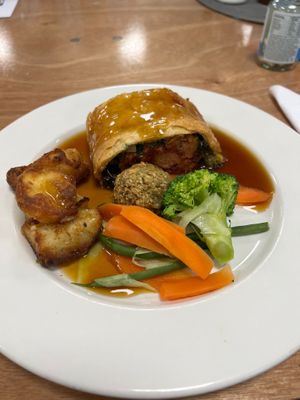 Amazing roast dinner with roast potatoes, stuffing balls feds and this time the Wellington had spinach inside with beetroot and seitan protein. Always amazing!  at Eat To The Beat in Aylesbury