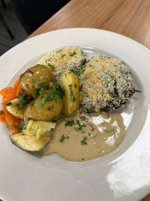 Mushrooms with cheesy crunchy breadcrumbs, creamy sauce veg and new potatoes  at Eat To The Beat in Aylesbury