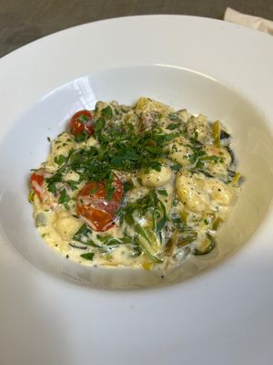 Creamy gnocchi with green veg at Eat To The Beat in Aylesbury