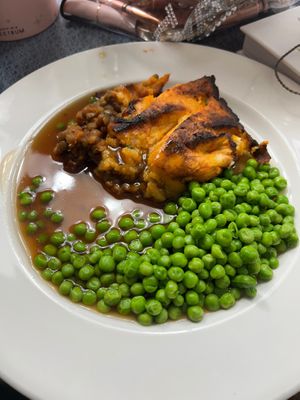 Lentil cottage pie, peas and gravy at Eat To The Beat in Aylesbury