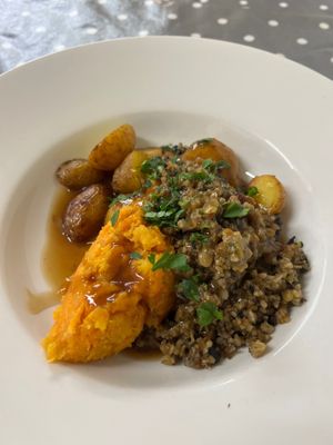 Scottish classic, vegan, haggis with neeps and tatties (parsnips and potato’s)  at Eat To The Beat in Aylesbury