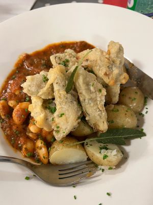 Tempura artichokes on a butter bean Ragu with new potatoes. at Eat To The Beat in Aylesbury