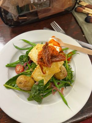 Amazing fried tofu with veg, sun-dried tomatoes, and a vegan pesto at Eat To The Beat in Aylesbury
