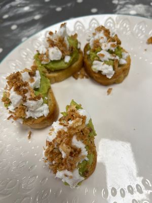 Avocado on toast with fried onion bits and vegan feta at Eat To The Beat in Aylesbury