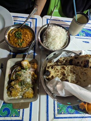 Bombay Potatoes and vegan Naan (curry on top not vegan) at Bombay Masala in Bugibba