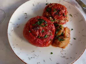 Stuffed tomatoes with rice and herbs with potatoes at Meltemi in Naxos