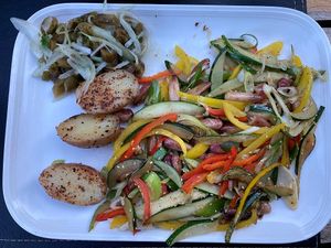 The vegan offer of the day: stir-fried veggies with Araucaria's pine nuts, potatoes with Merkén and Cochayuyo Ceviche at Ruta al Conguillio in Melipeuco