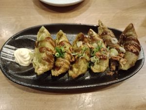 Okonomi Gyoza (non vegan mayo on the side! Normally served on top therefore veggie) very delicious Gyoza :) at Takumi Ramen Kitchen in Vienna