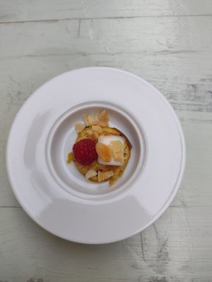 Amuse-bouche - vegan feta on sweet potato with nuts and raspberry at TERRA in Funchal