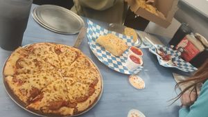 Vegan pepperoni pizza, vegan cheesebread, vegan meatballs (out of frame, VERY happy vegans!) at Slice and Dice Pizzeria in Albuquerque