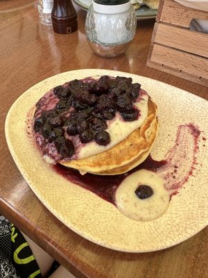 Vegan blueberry pancakes with Algarve syrup and vegan vanilla yoghurt   at Neighbours in Tenerife