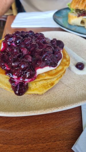 Vegan fluffy pancakes with soy yoghurt and blueberries at Neighbours in Tenerife