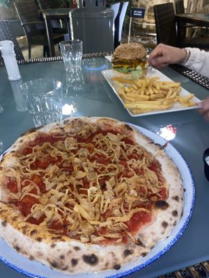 Pizza with no cheese & fried onions(the best ever) vegan cheese is available & Beyond Meat Burger   at Badass Burgers in St Julians