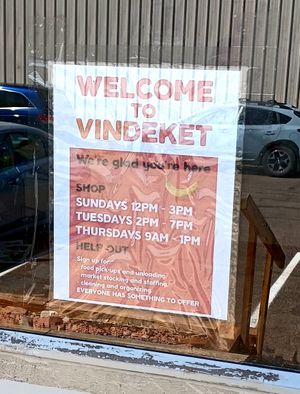 Front door and current hours at Vindeket Foods in Fort Collins