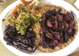 Piatto medio con cous-cous, radicchio, carote e broccoli in salsa  at Animo Cucina Naturale in Brescia