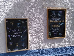 Boards outside at El kamaleon sabroson in Granada