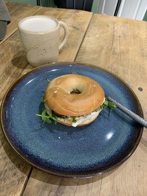 Vegan salmon and cream cheese bagel with oat milk latte  at Zola's Bakery in Galashiels