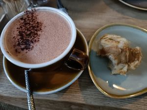 Lovely hot chocolate with oat milk and a Biscoff Cruffin. at Zola's Bakery in Galashiels