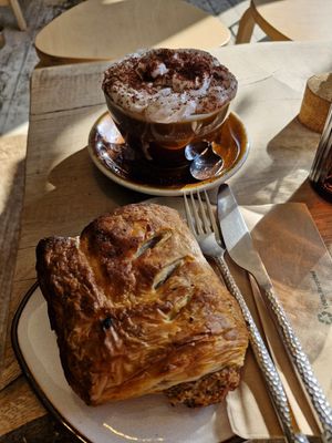 Mint hot chocolate and sausage roll with chilli jam at Zola's Bakery in Galashiels