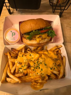 Single signature burger, plant style fries, and an extra side of plant sauce at Plantees in Orlando