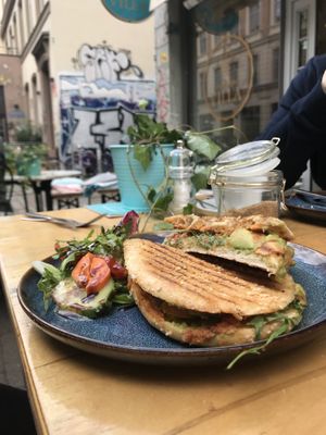 Vegan panini bread with avocado, arugula and homemade pesto  at Gretchens Villa in Hamburg