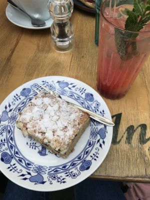Homemade lemonade with vegan cherry streusel cake  at Gretchens Villa in Hamburg
