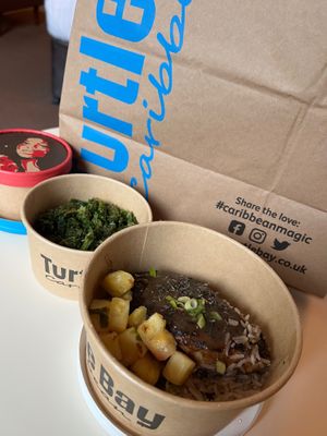 Vegan jerk chicken with coconut rice and peas. Also a side of greens at Turtle Bay in Sheffield
