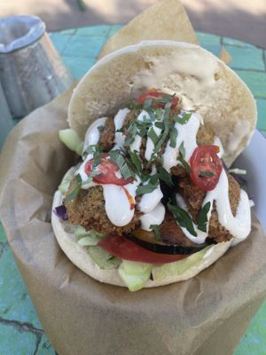 Falafel pita with tahini and grilled eggplant  at Mazel Cafe - مزال  in Marrakech