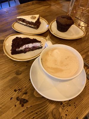 Oat latte, mole mound, carrot cake and chocolate muffin  at Frogmoon in Aberdeen