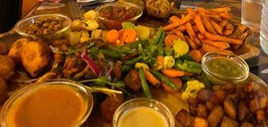 Our delicious vegan platter with tofu, cassava, sweet potato fries, plantain, beignet, beans, veggies and a selection of sauces at Chez Ani in Strasbourg