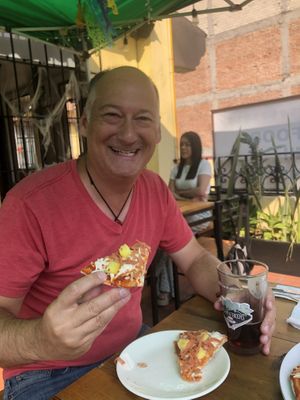 Vegan pizza on the patio  at Vegan&Beer in Mexico City