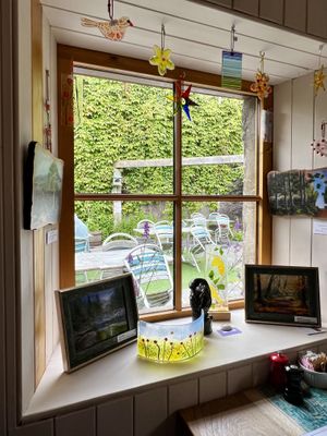 Art with view of garden   at High St Merchants in Grantown On Spey