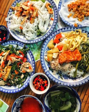 Fried noodles, banh beo, mixed vegetables, com (rice with mixed dishes and side soup) at Thanh Lieu in Hue
