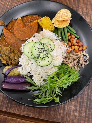 Nasi Lemak Hijau RM25
It's not your regular Nasi Lemak. It's a breakfast dish originating in Malay cuisine,
served with sambal and Vege fish
 at Hijau - 绿 in Kuala Lumpur