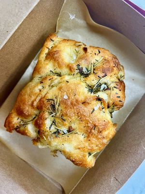 Must-try: Vegan garlic-rosemary focaccia bread. Obsessed!  at Val's Bakery in Dayton