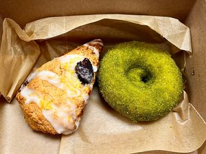 Blackberry lemon scone and matcha donut   at Val's Bakery in Dayton
