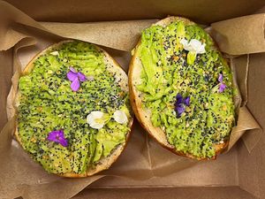 Avocado Bagel (locally made bagels and topped with local edible flowers)   at Val's Bakery in Dayton