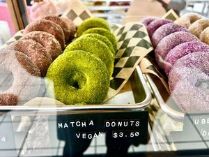 Vegan matcha donuts in the case   at Val's Bakery in Dayton